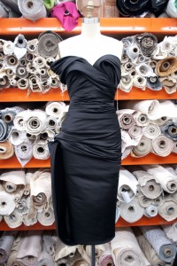 ...and this ruched dress of poly satin...