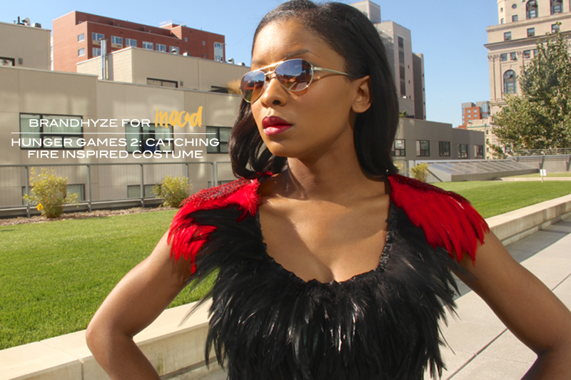 Hunger Games 2 Catching Fire costume using feather pads and feather fringe from Mood Fabrics.