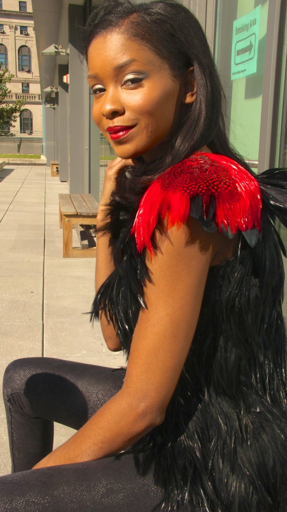 Hunger Games 2 Catching Fire costume using feather pads and feather fringe from Mood Fabrics.