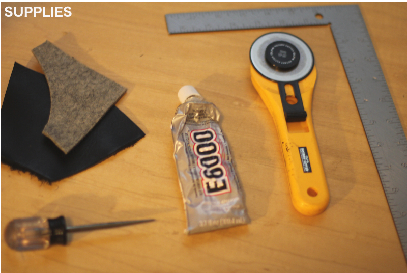 All supplies needed to create reversible leather and felt coasters in the shape of a hexagon. There are swatches of leather and felt, an awl, E6000 glue, a rotary cutter and a straight edge ruler.