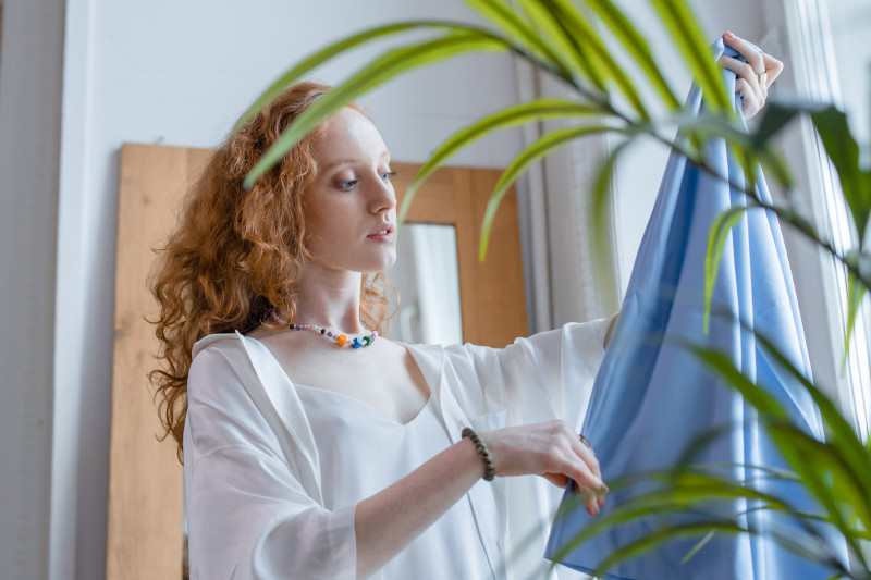 woman holding fabric