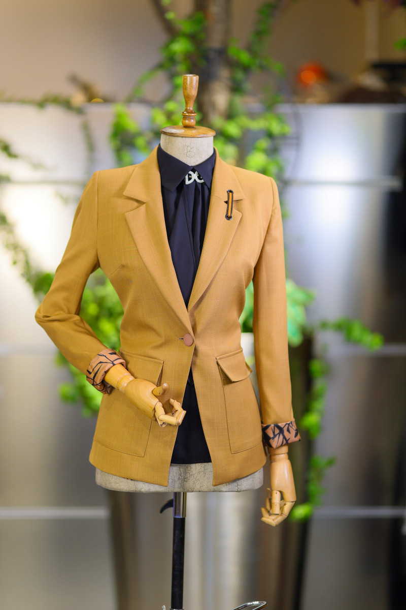 yellow blazer on dress form