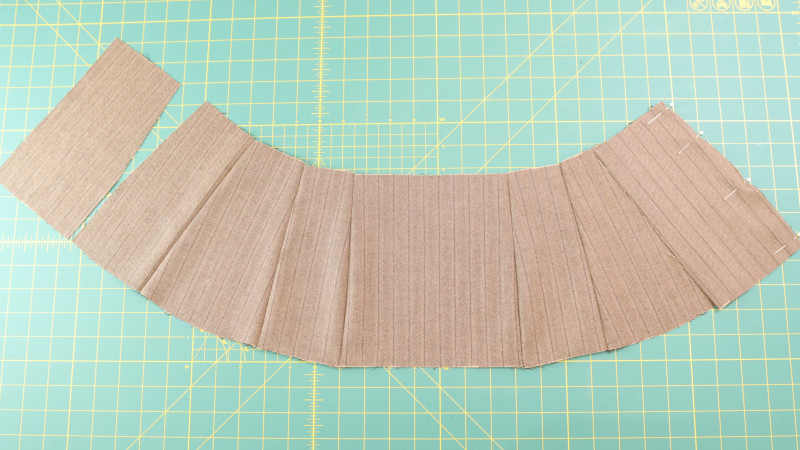 How To Sew The Lower Back Center Pieces To Each Side of The Lower Back Side Pieces For The Ela Peplum Top in Striped Suiting Fashion