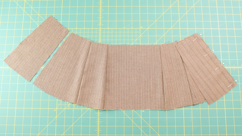 How To Sew The Lower Side Back Pieces To The Lower Side Pieces For The Ela Peplum Top in Striped Suiting Fashion Fabric