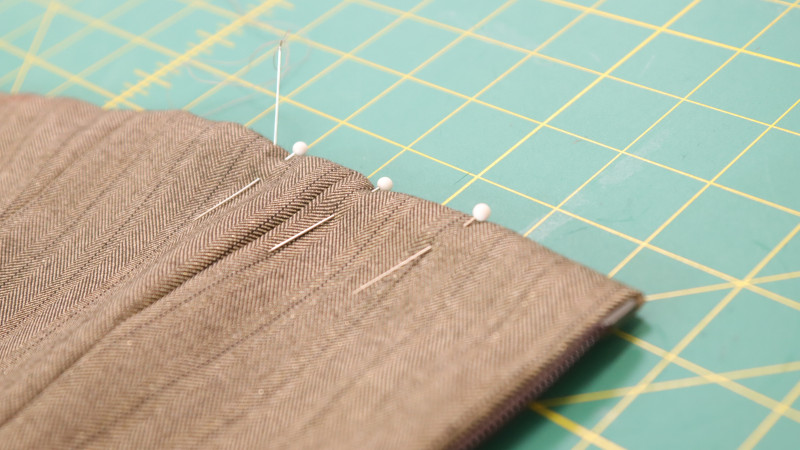 How To Sew The Opening Closed By Sewing The Seam Allowance Inward With An Invisible Stitch For The Ela Peplum Top in Striped Suiting Fashion Fabric