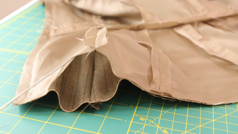 How To Leave an Opening Gap on the Peplum Top to Turn The Garment Right Side Out After Sewing The Main Fabric and The Lining Together For The Ela Peplum Top in Striped Suiting Fashion Fabric