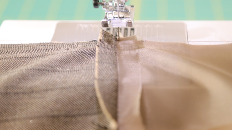 How To Under Stitch The Lining To The Seam Allowance For The Ela Peplum Top in Striped Suiting Fashion Fabric