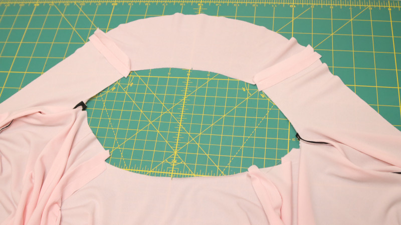 Sew the Top Back Facing to the Front Facing at the shoulder seams.