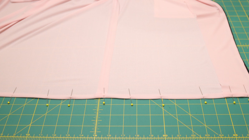 Finish the bottom edge around the shirt with a 1/2" hem using a twin needle.