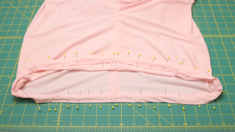 Press the top of the pants inward at the seam allowance and the fold line. Sew across the waistline leaving a 1" gap at center back.