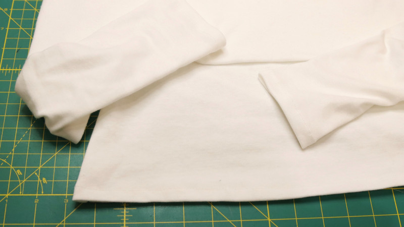 Sew the hem at the bottom and repeat for the sleeves.