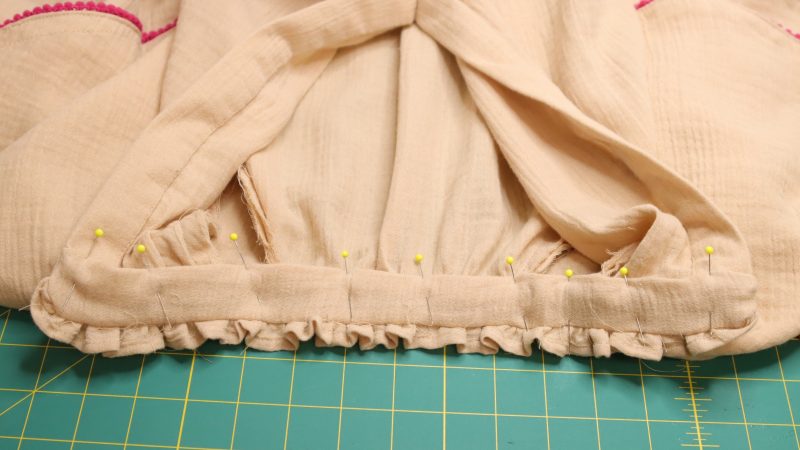 How to finish the collar by sewing it to the inside of the neckline