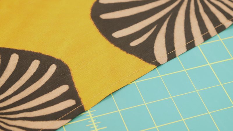 How to sew a 1/4" double-folded hem around the neckline