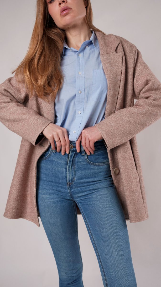Model wearing Bergen Coat sewn in Ketil Boiled Wool Coating – Oatmeal Marbled from Mood Fabrics