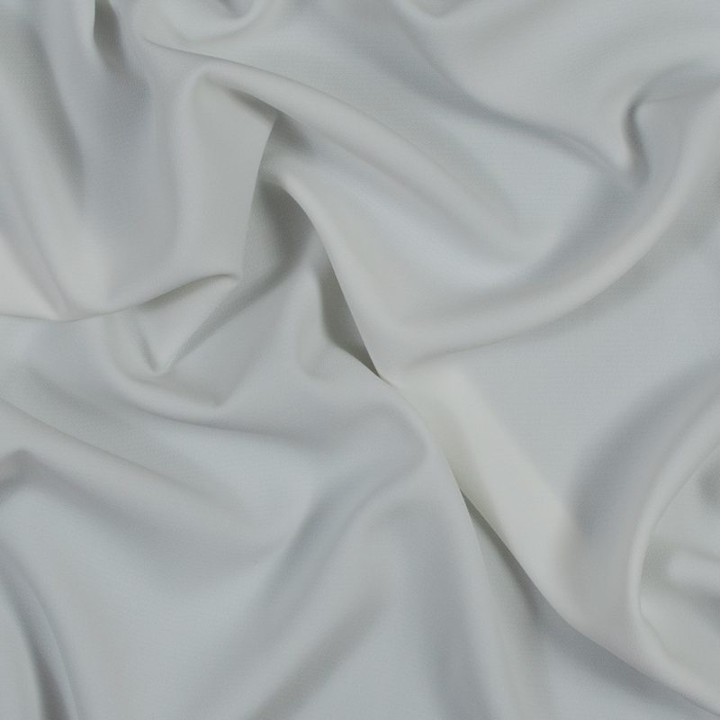 Close up of White Stretch Polyester 4-Ply Crepe from Mood Fabrics