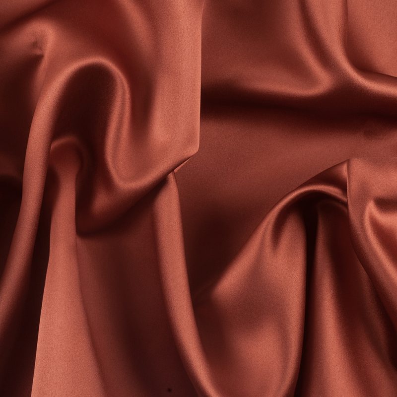 Close up of Polyester Satin - Sienna - Reverie Collection from Mood Fabrics | Sienna Polyester Satin Fashion Fabric - Reverie Collection - Mood Fabrics - MS-SIENNA - Perfect for Transitional Sewing Patterns