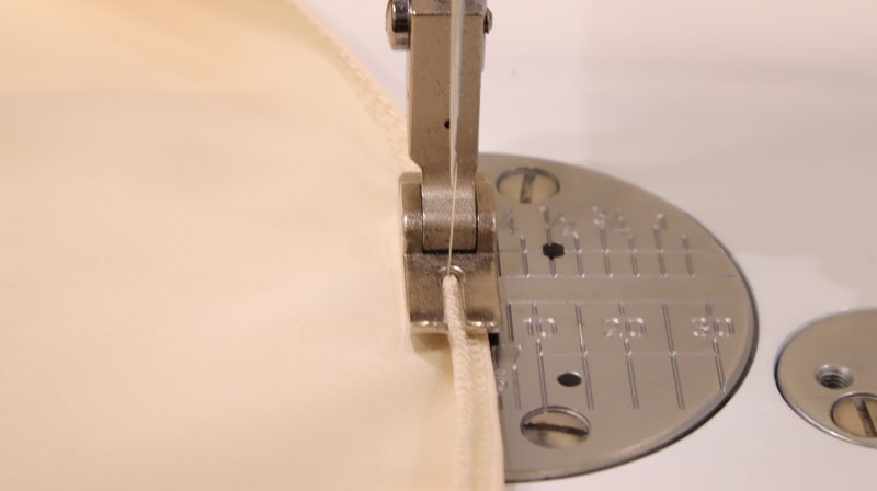How To Serge Bottom Hem - Polyester-Double-Georgette-Mimosa-Collection - Baratti Blouson Dress - MDF457 - Mood Fabrics Sewciety Blog Serge the bottom edge, fold it once, then straight stitch to complete the hem.