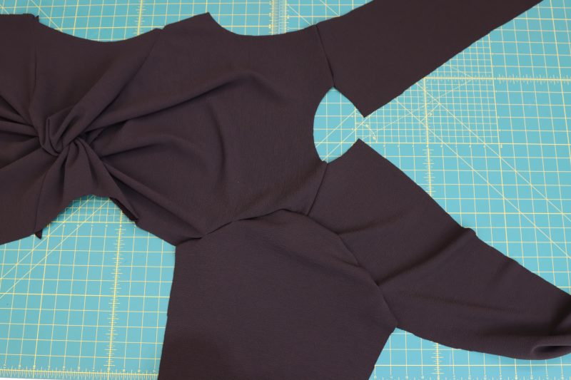 How-To-Sew-Sleeves-to-Armscyes-Dark Chocolate Stretch Polyester Crepe Knit--Mood-Fabrics Sew sleeve to armscye.