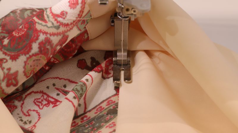 How To Understitch Lining Front Openings - Polyester-Double-Georgette-Mimosa-Collection - Baratti Blouson Dress - MDF457 - Mood Fabrics Sewciety Blog Under stitch the lining at the front openings.
