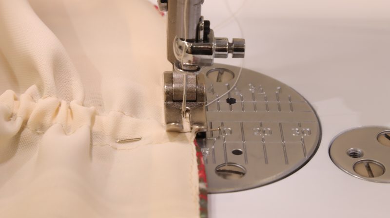 How To Secure Ends Of Waistband Channel - Polyester-Double-Georgette-Mimosa-Collection - Baratti Blouson Dress - MDF457 - Mood Fabrics Sewciety Blog Secure ends of elastic and close both sides of the tunnel.