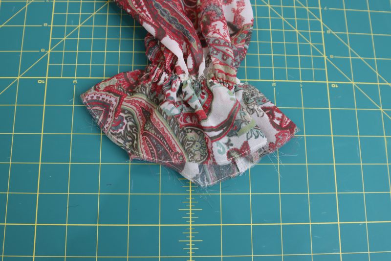 How To Secure Sleeve Elastic Straight Stitch - Italian-Polyester-Georgette - Baratti Blouson Dress - MDF457 - Mood Fabrics Sewciety Blog Secure elastic with a straight stitch to create ruffled sleeves.