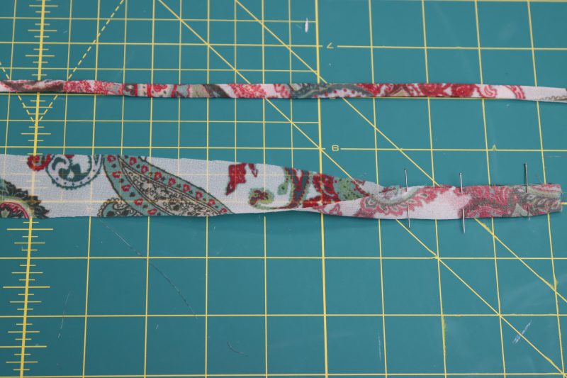 How To Fold Cord Strips Longways - Italian-Polyester-Georgette - Baratti Blouson Dress - MDF457 - Mood Fabrics Sewciety Blog Fold each fabric strip longways and sew with ¼ inch seam allowance.