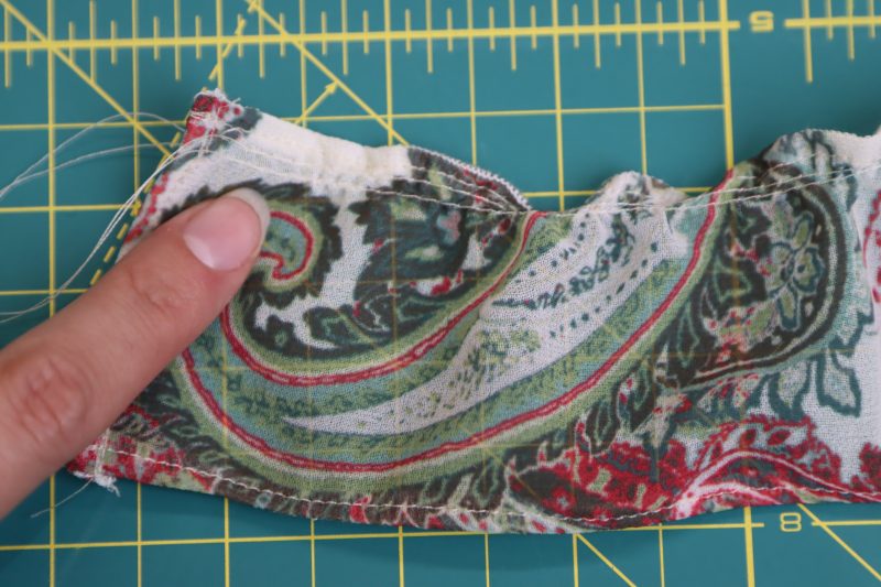 How To Gather Bottom Ruffle - Italian-Polyester-Georgette - Baratti Blouson Dress - MDF457 - Mood Fabrics Sewciety Blog Begin gathering the bottom ruffle using two parallel straight stitches sewn ¼ inch away from the edge.