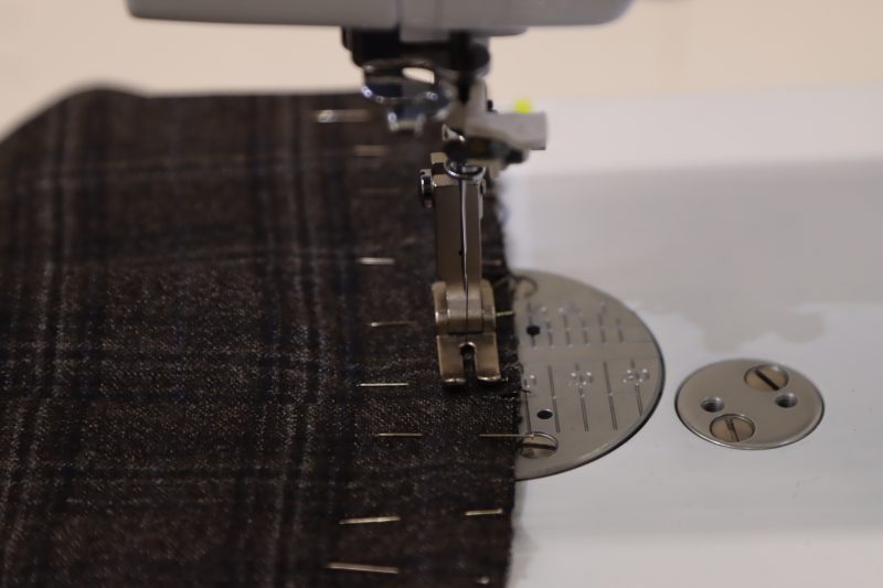How To Sew Shell Pleats - Super 130s Wool Twill Suiting Made in Italy Charcoal Gray Navy Plaid Deadstock - Mood Fabrics - Oxford Pleated Skirt and Tie Free Sewing Pattern Tutorial - MDF460 - Mood Fabrics Sewciety Blog - Sew the pleats down on the shell piece.