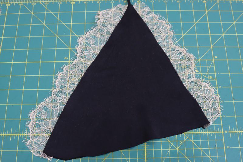 How To Sew Sides Of Bra Cups - Washed Silk Charmeuse 19mm Black - Mood Fabrics - Odette Nightgown Free Sewing Pattern Tutorial - MDF462 - Mood Fabrics Sewciety Blog - Sew the sides of the triangle and flip the bra cup right sides out.
