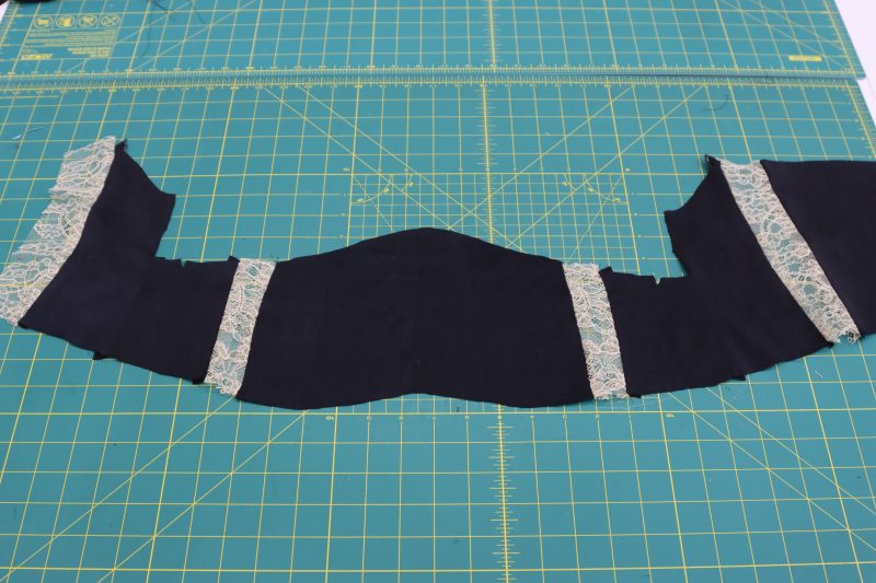 How To Sew Silk Panels For Underbust - Washed Silk Charmeuse 19mm Black - Mood Fabrics - Odette Nightgown Free Sewing Pattern Tutorial - MDF462 - Mood Fabrics Sewciety Blog - Sew each piece of silk to its corresponding lace cutout, ensuring that the width of the lace between each panel is 1.25 inches after sewing.