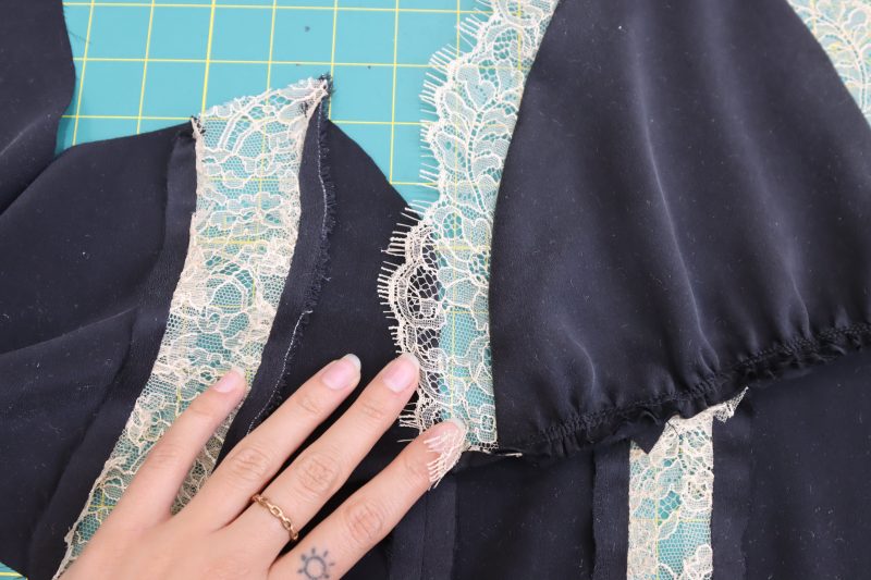 How To Pin Sew Bra Sides to Underbust - Washed Silk Charmeuse 19mm Black - Mood Fabrics - Odette Nightgown Free Sewing Pattern Tutorial - MDF462 - Mood Fabrics Sewciety Blog - Pin and sew the sides of the bra cups to the back-side of the underbust.