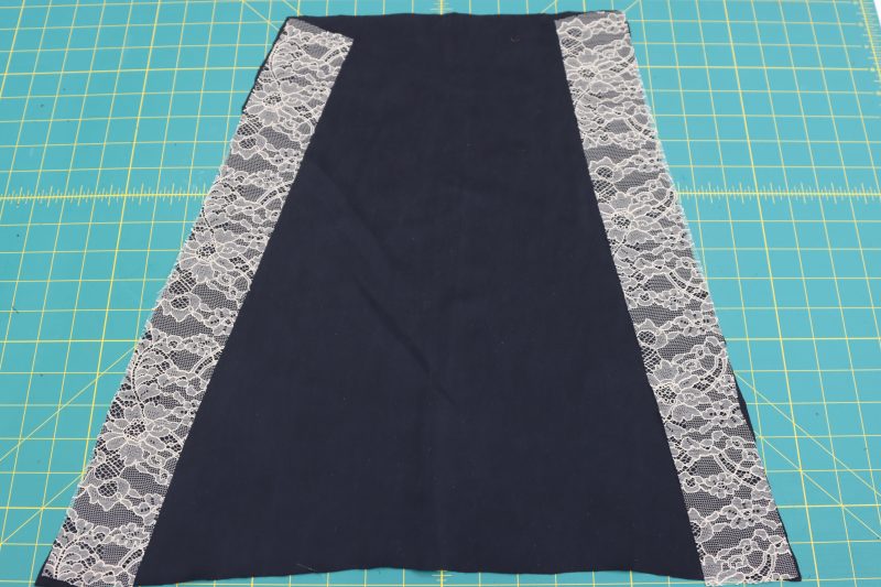 How To Sew Lace Cutouts To Front And Back Panels - Washed Silk Charmeuse 19mm Black - Mood Fabrics - Odette Nightgown Free Sewing Pattern Tutorial - MDF462 - Mood Fabrics Sewciety Blog - Sew lace cutouts to the left and right side of the front and back skirt panels.