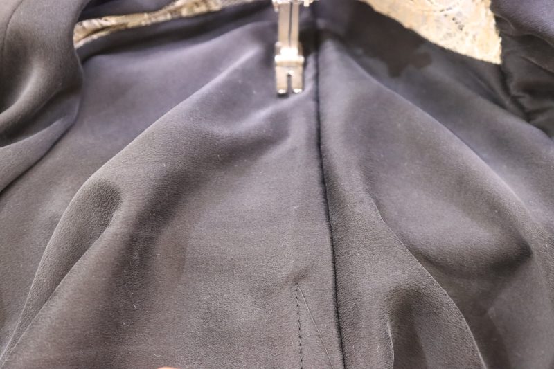 How To Topstitch Seam Allowance - Washed Silk Charmeuse 19mm Black - Mood Fabrics - Odette Nightgown Free Sewing Pattern Tutorial - MDF462 - Mood Fabrics Sewciety Blog - Topstitch the raw edge of the 1 inch seam allowance to the dress to create a tunnel.