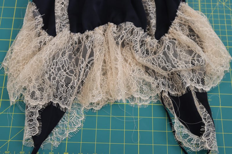 How To Sew Gathered Lace To Underbust - Peach Floral Scalloped Re Embroidered Lace with Eyelash Fringe - Mood Fabrics - Odette Nightgown Free Sewing Pattern Tutorial - MDF462 - Mood Fabrics Sewciety Blog - Sew the gathered edge of the underbust ruffle to the dress.