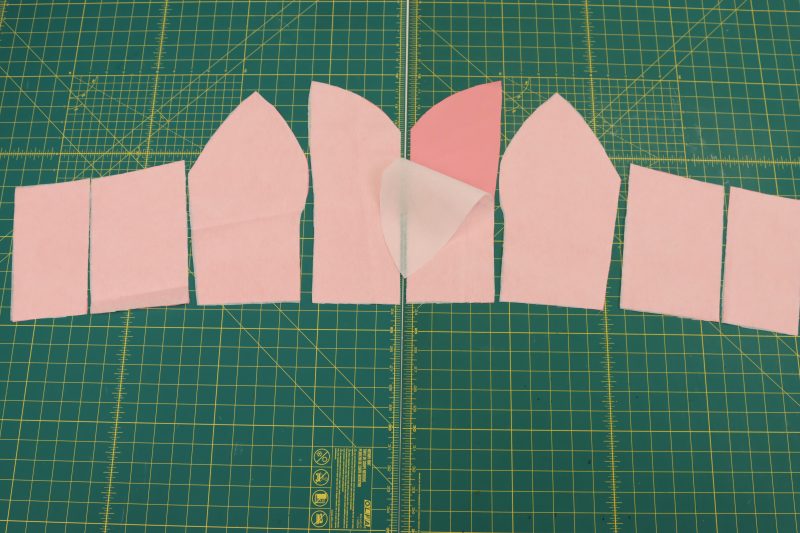 How To Iron Interfacing To Bodice Shell - Satin - Mood Fabrics - Glinda Gown Free Sewing Pattern Tutorial - MDF463 - Mood Fabrics Sewciety Blog - Iron interfacing to bodice pieces.