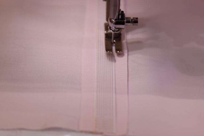 How To Sew Boning To Lining - Rigilene - Mood Fabrics - Glinda Gown Free Sewing Pattern Tutorial - MDF463 - Mood Fabrics Sewciety Blog - Sew down both sides of the boning.