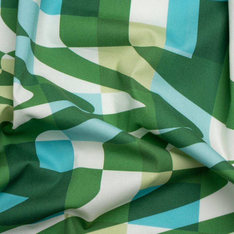 Material for sewing very own Halloween costume ideas. Mood Exclusive Green Game of Haze Stretch Cotton Poplin Fashion Fabric Material for Kiri Dress free sewing pattern costume ideas. Shop Mood Fabrics for your halloween costume making supplies.