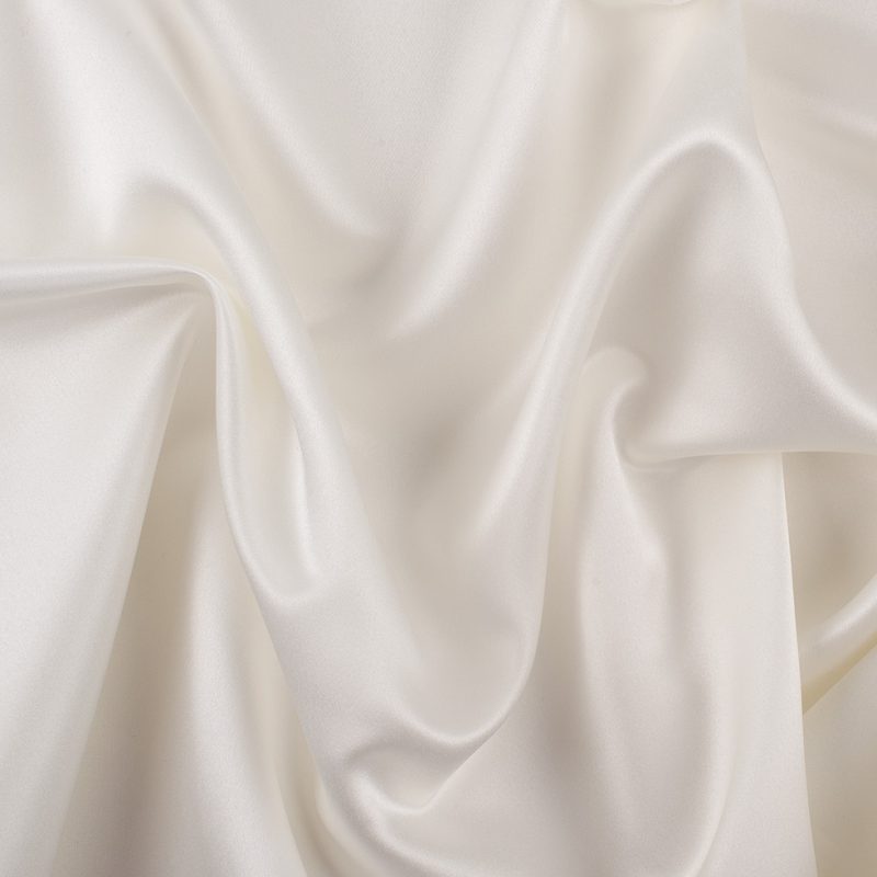 Material for sewing very own Halloween costume ideas. Polyester Satin Ivory Reverie Collection Fashion Fabric Material for Madison Tea Length Dress free sewing pattern costume ideas. Shop Mood Fabrics for your halloween costume making supplies.