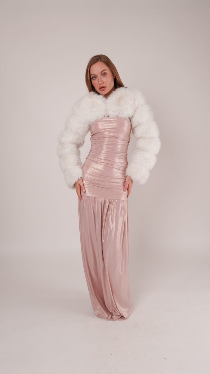 Full view of the Rosalina Bodycon Dress styled with a plush white faux fur jacket, showing the foiled knit finish and body-hugging silhouette inspired by Old Hollywood icons.