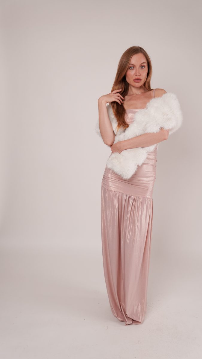 Woman in a blush pink metallic gown with ruched bodice and white faux fur wrap, styled as an Old Hollywood costume idea using the Rosalina Dress free sewing pattern.
