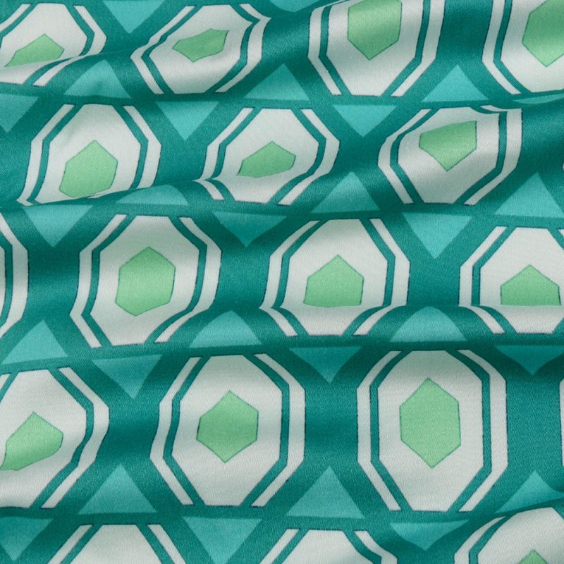 Material for sewing very own Halloween costume ideas. Stretch Cotton Sateen Turquoise Honeycomb Diamonds Yesterday Collection Fashion Fabric Material for Kiri Dress free sewing pattern costume ideas. Shop Mood Fabrics for your halloween costume making supplies.