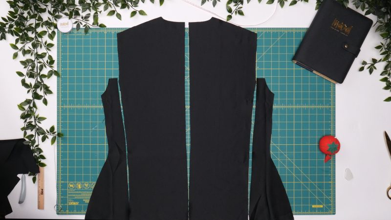 How To Pin Sew Back Shell Seams - - Mood Fabrics - Nolita Vest and Skirt Set Free Sewing Pattern Tutorial - MDF466 MDF467 - Mood Fabrics Sewciety Blog - Pin and sew back side pieces to back center pieces. Then, pin and sew the back center pieces right sides together.