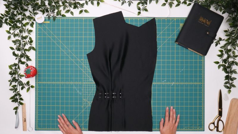 How To Pin Sew Pocket Welts - - Mood Fabrics - Nolita Vest and Skirt Set Free Sewing Pattern Tutorial - MDF466 MDF467 - Mood Fabrics Sewciety Blog - Pin and sew the welts along the perimeter of the rectangular marking for the welt pocket.
