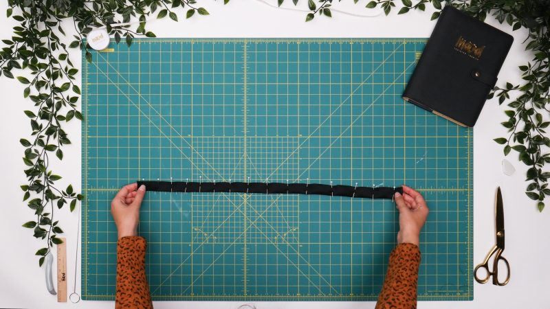 How To Pin Sew Bias Strip - - Mood Fabrics - Nolita Vest and Skirt Set Free Sewing Pattern Tutorial - MDF466 MDF467 - Mood Fabrics Sewciety Blog - Pin and sew bias strip right sides together with ⅝ inch seam allowance.