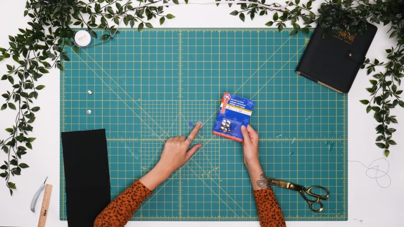 How To Place Fabric Into Rubber Holder - - Mood Fabrics - Nolita Vest and Skirt Set Free Sewing Pattern Tutorial - MDF466 MDF467 - Mood Fabrics Sewciety Blog - Place a piece of the main fabric into the rubber holder piece.