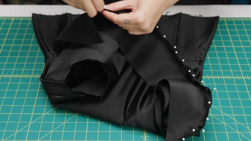 How To Pin Collar To Neckline - - Mood Fabrics - Nolita Vest and Skirt Set Free Sewing Pattern Tutorial - MDF466 MDF467 - Mood Fabrics Sewciety Blog - Pin collar pieces to the neckline of the shell and lining by lining up the notches.