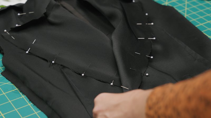 How To Pin Front Opening Of Vest - - Mood Fabrics - Nolita Vest and Skirt Set Free Sewing Pattern Tutorial - MDF466 MDF467 - Mood Fabrics Sewciety Blog - Pin around the entire front opening of the lining and shell, attaching the two at the collar and front closure.