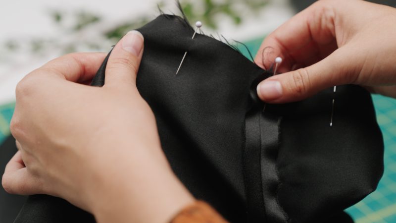 How To Pin Armscye Opening - - Mood Fabrics - Nolita Vest and Skirt Set Free Sewing Pattern Tutorial - MDF466 MDF467 - Mood Fabrics Sewciety Blog - Place pins all around the armscye, keeping the lining and the shell right sides together.