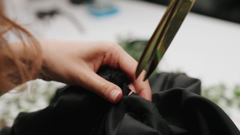How To Clip Notches Into Armscye - - Mood Fabrics - Nolita Vest and Skirt Set Free Sewing Pattern Tutorial - MDF466 MDF467 - Mood Fabrics Sewciety Blog - Clip notches under the armpit.