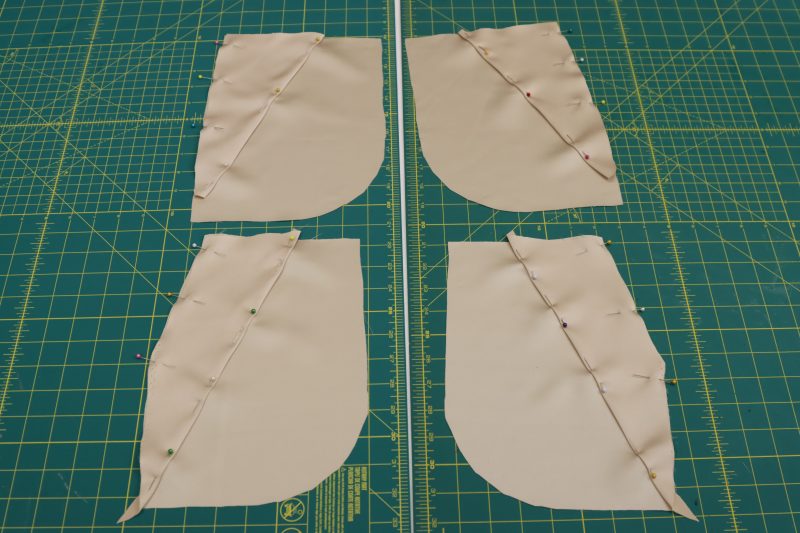 How To Pin Pocket Facings To Pocket Bags - Satin - Mood Fabrics - Firenze Blouse Trousers Free Sewing Pattern Tutorial - MDF464 - Mood Fabrics Sewciety Blog - Pin the pocket facings to the pocket bags.